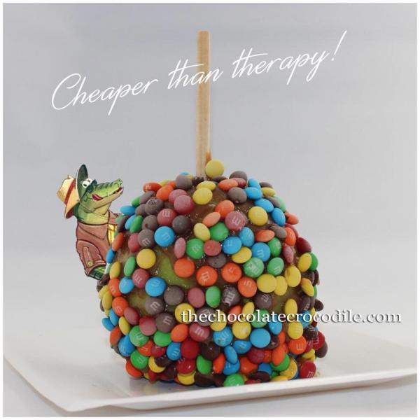 Take a bite of a chocolate dipped apple covered with M&Ms! mmmmm delicious! 